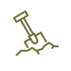 A shovel embedded in dirt