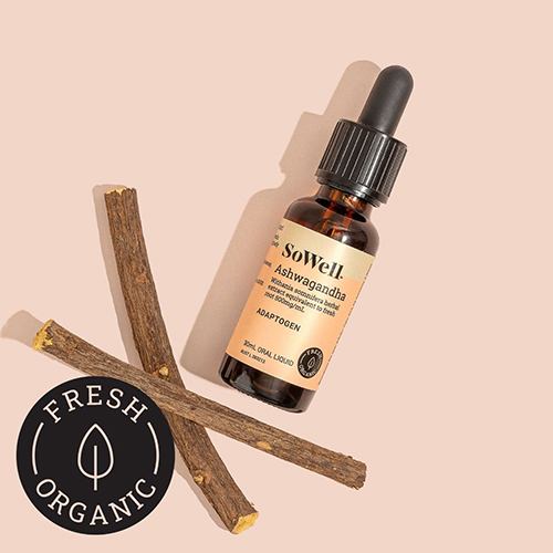 A 30ml bottle of Sowell Ashwagandha on a light brown background next to several roots