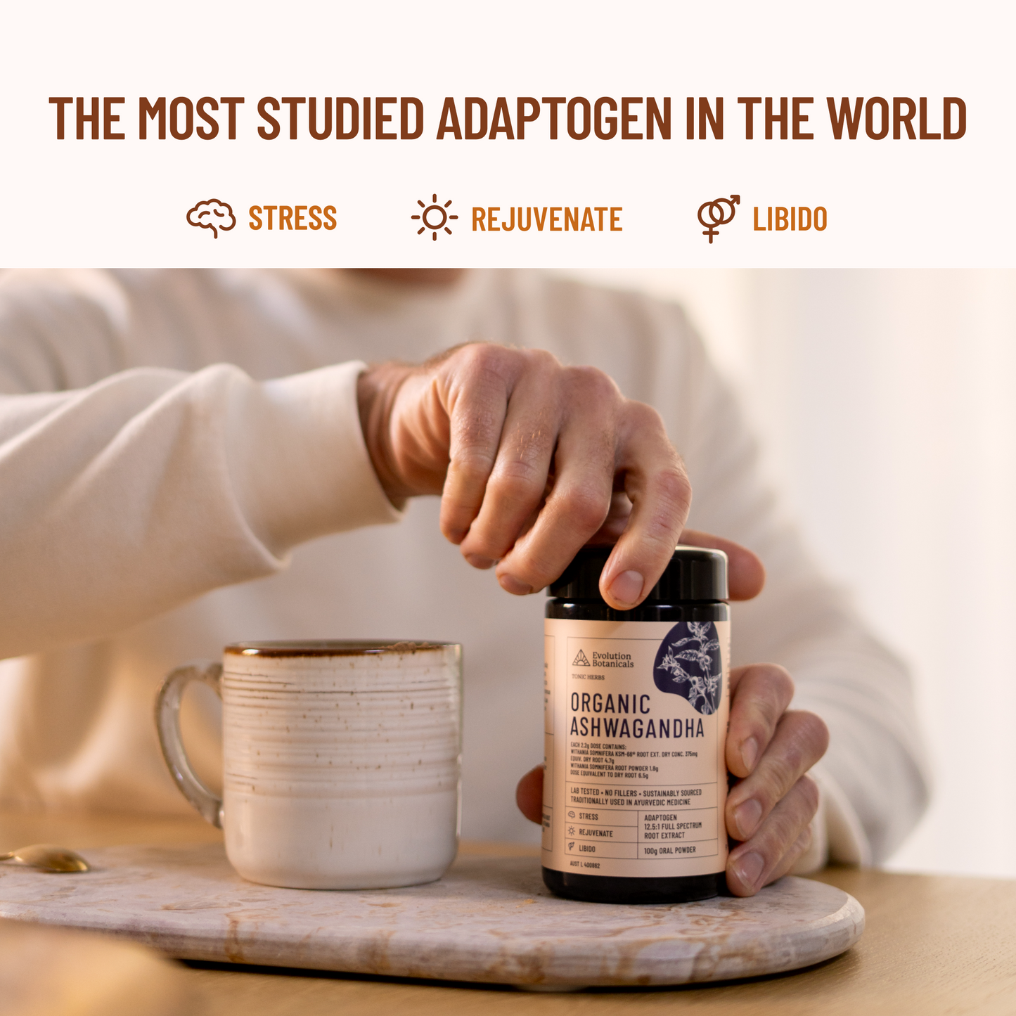 man opening jar of ashwagandha