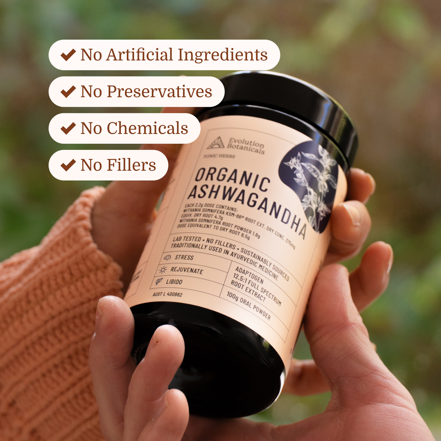 man and women holding jar of ashwagandha