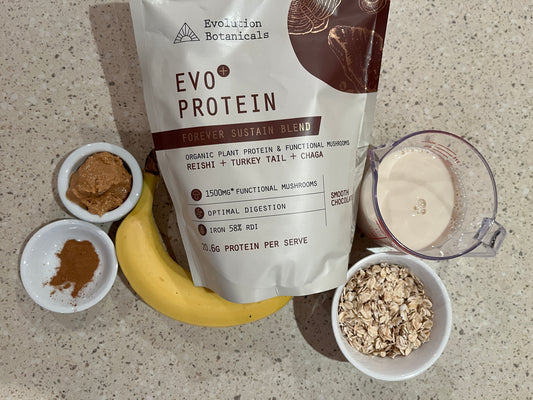 Ingredients needed to create the smoothie including: a banana, oats, cinnamon, peanut butter, milk and  A bag of Evolution Botanicals Evo+ Protein Smooth chocolate