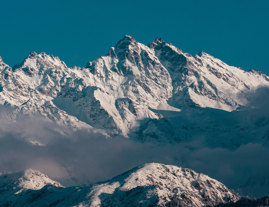 Snowy mountains with a blue sky