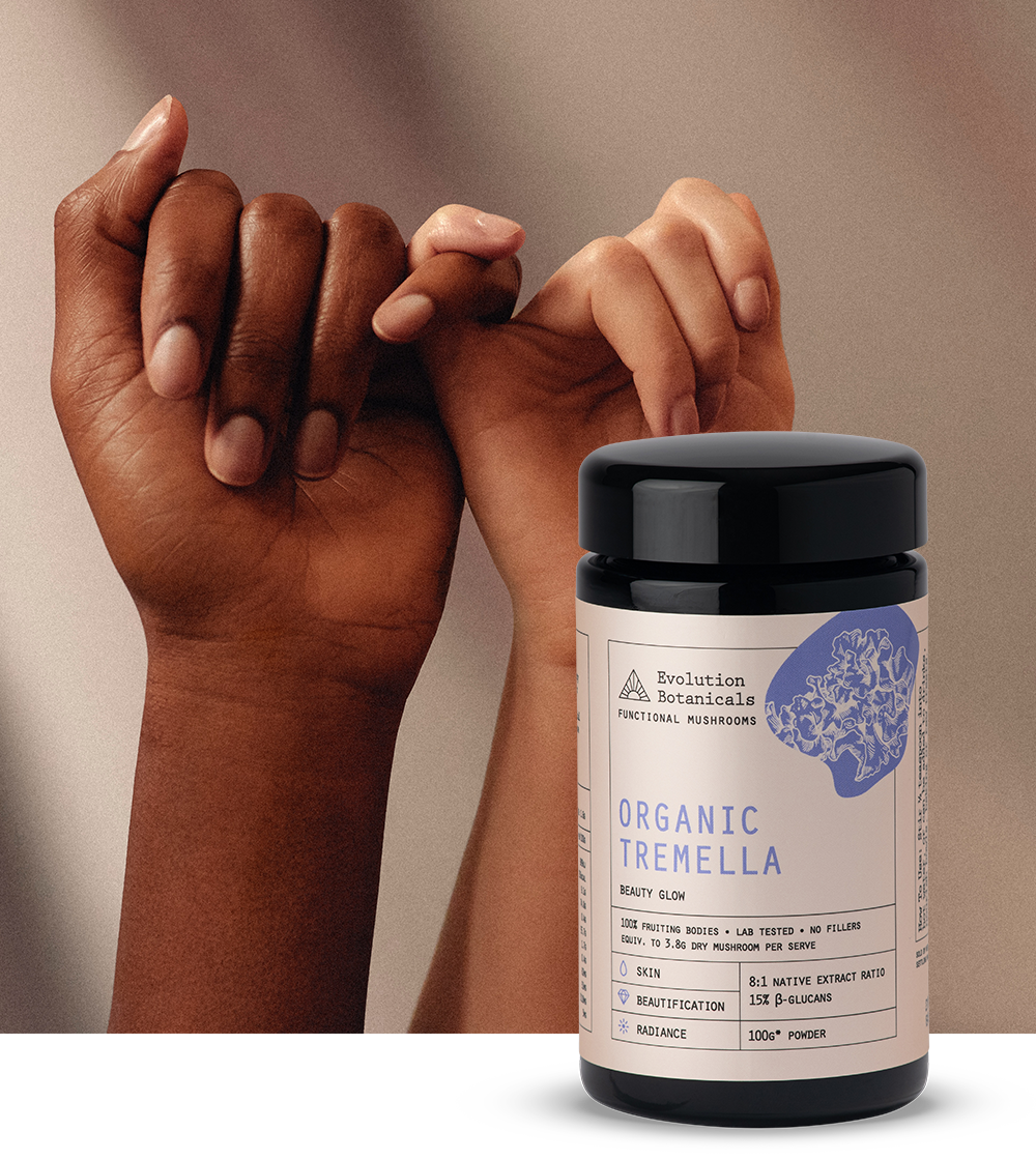 Two people hooking their pinky fingers together with a jar of Organic Tremella overlayed on top of the image. 