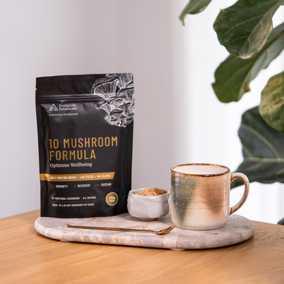 bulk pack of 10 mushroom formula on table with mug next to it 