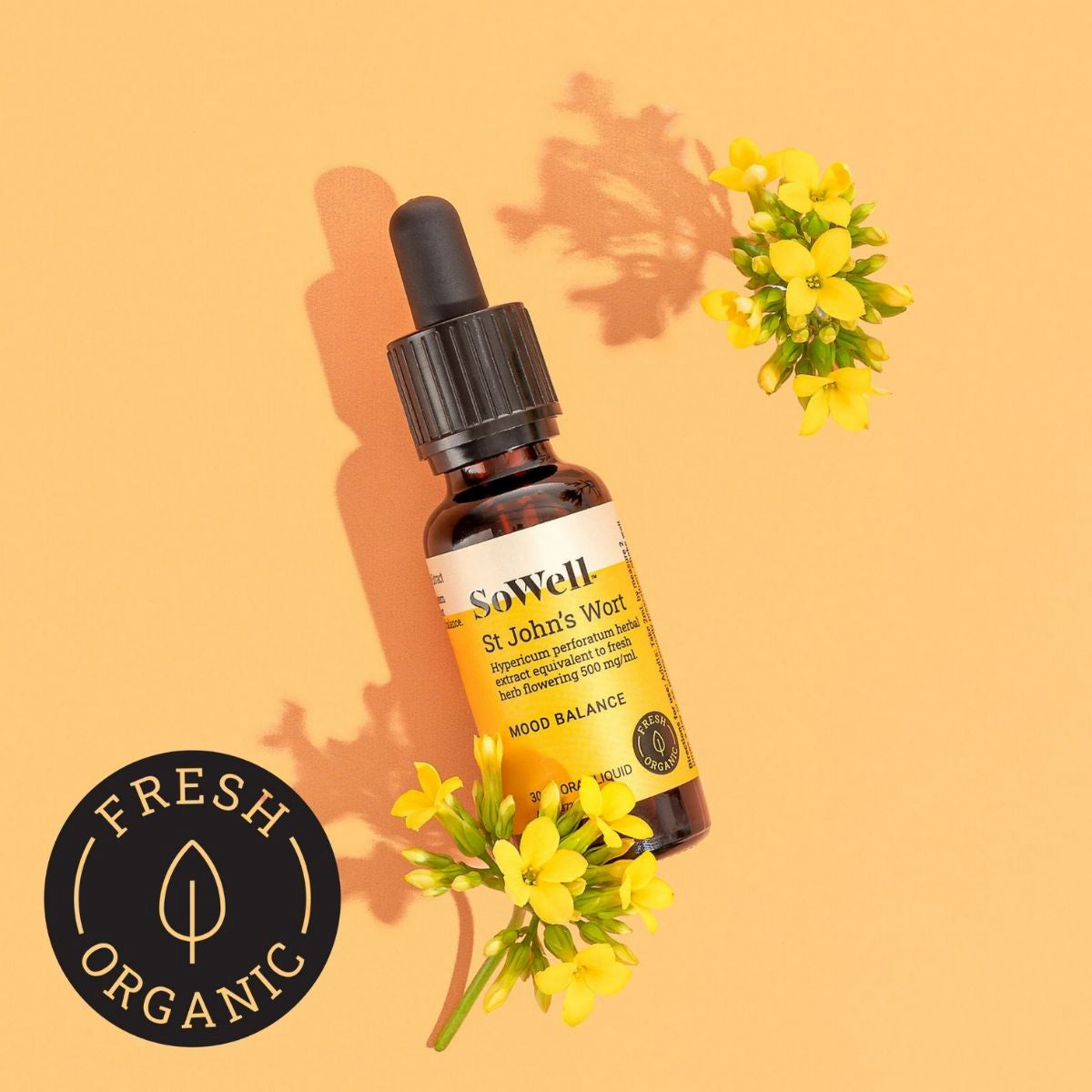 30ml dropper bottle of Sowell St John's Wort tincture on a yellowish background surrounded by flowers