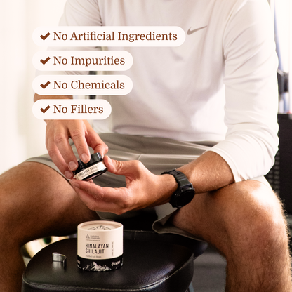 man holding jar of shilajit resin in a gym setting 