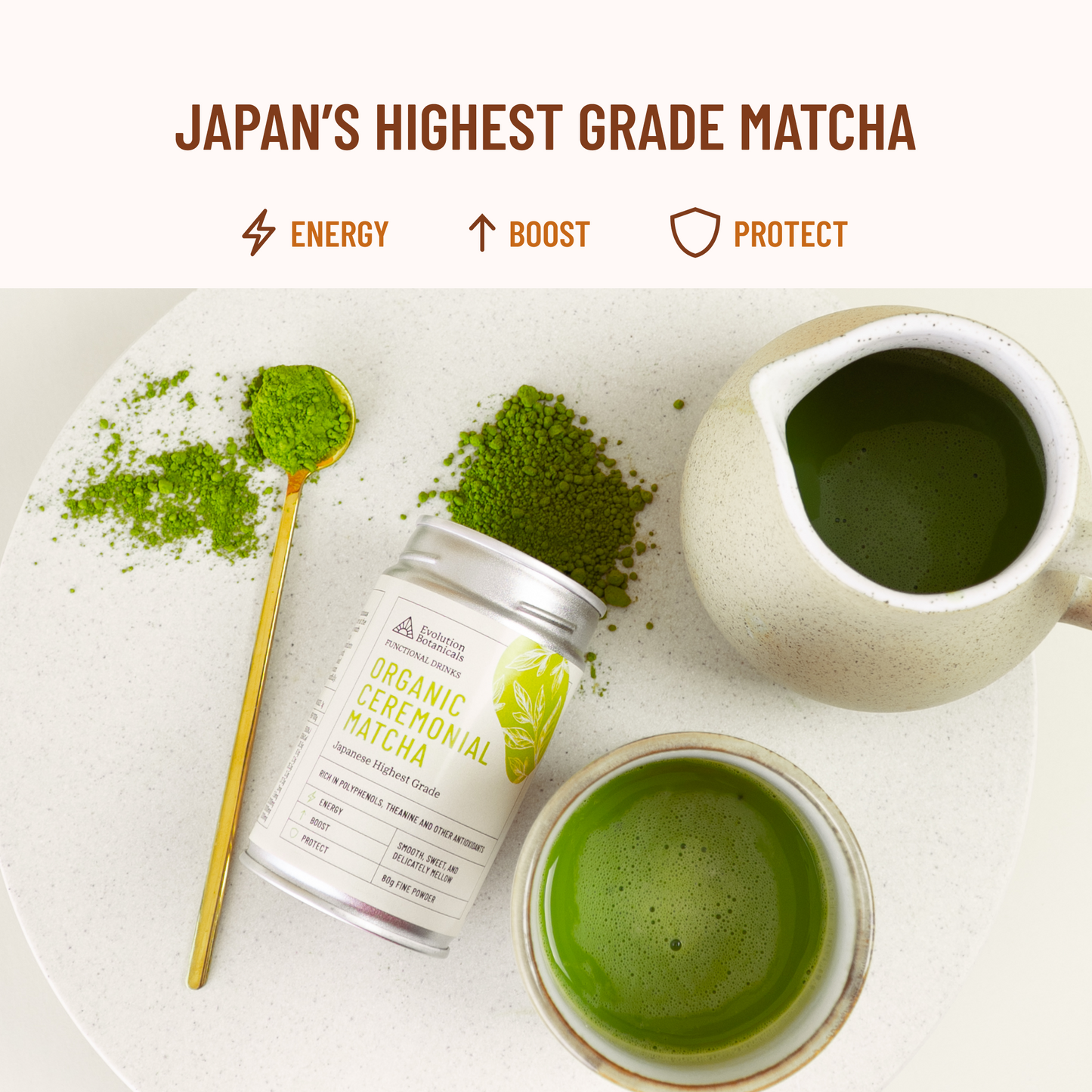 ceremonial matcha lying on bench top with spoon of matcha sitting next to it