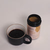 1.7g of Cordyceps Militaris being added to a black coffee 